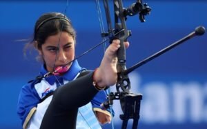 Archery Paralympics player shooting arrow