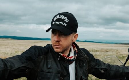Danny Jones Wins Back-to-Back Reality Shows as He Opens Up on Music, Family, and $8M Net Worth Danny Jones in black dress and cap