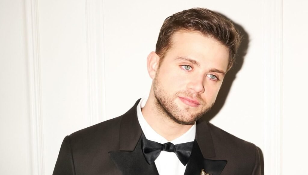 leo woodall in black suit