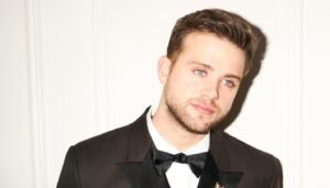 leo woodall in black suit