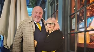 Marj Hogarth with another man standing together