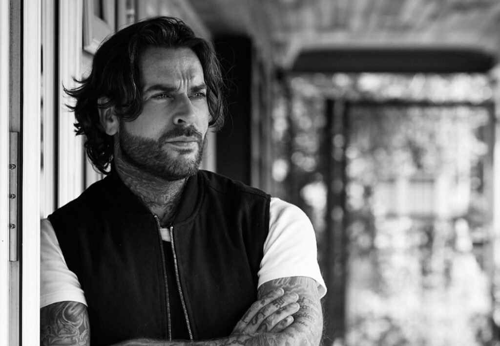 Pete Wicks posing for photograph