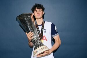 Archie Gray holding trophy