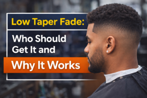 Low taper fade haircut showing a clean fade around the ears and neckline with longer hair on top